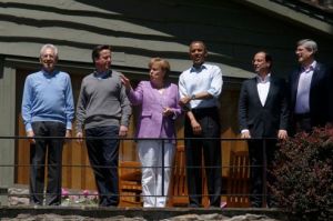 G8 leaders stand together as the leaders gather for a family photo at the G8 Summit at Camp David